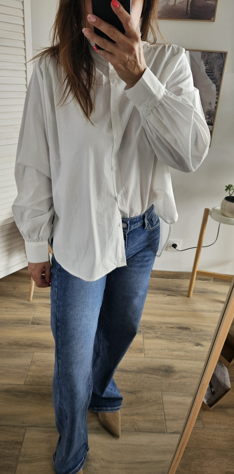 Chemise blanche à col volanté